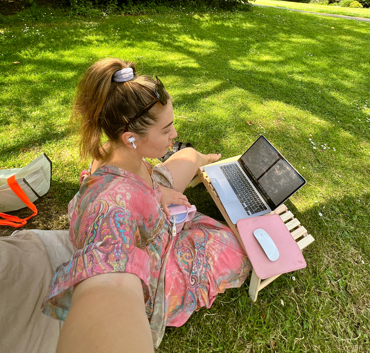 Working on laptop during Bath in summer