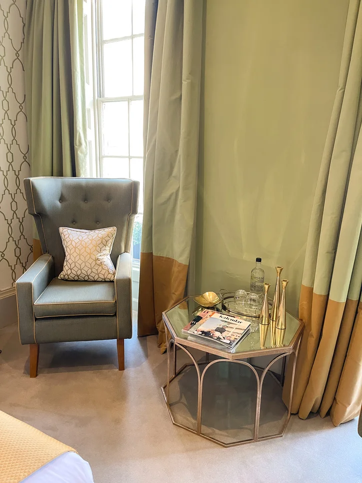 A cosy corner in a bedroom at The Queensberry