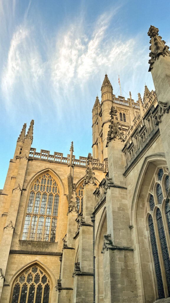 The exterior of Bath Abbey looking up