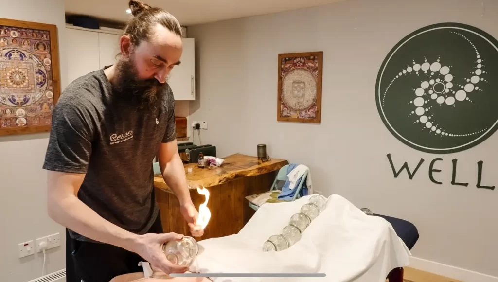 Joe, the owner of Well Bath, in a holistic therapy treatment.